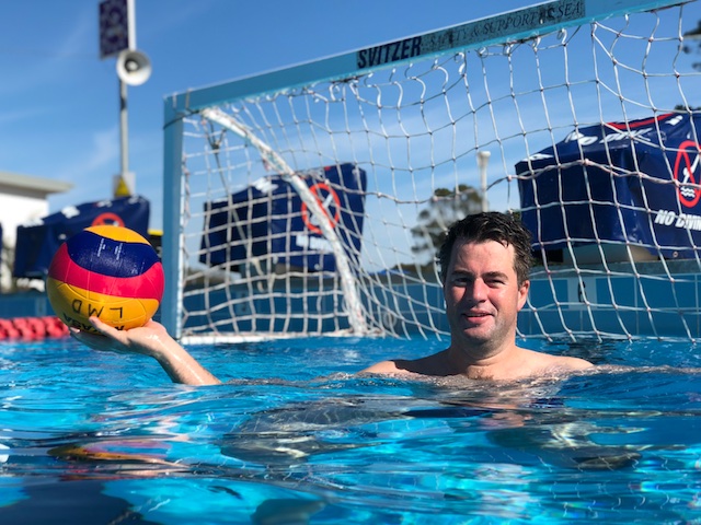 lake macquarie dolphins swansea nsw holding water polo ball in front of goals